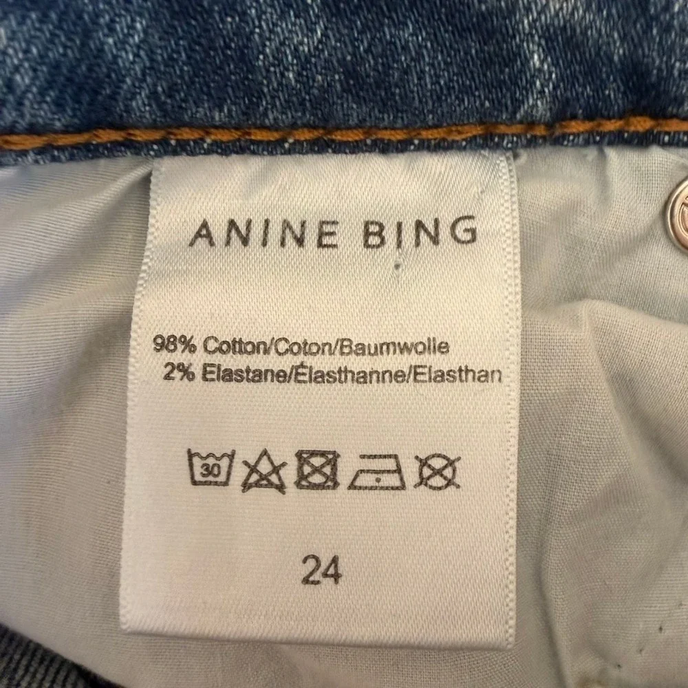 Anine Bing‎ High Rise Flare Jeans Light Wash Blue Raw Hem Size 24 Button Fly